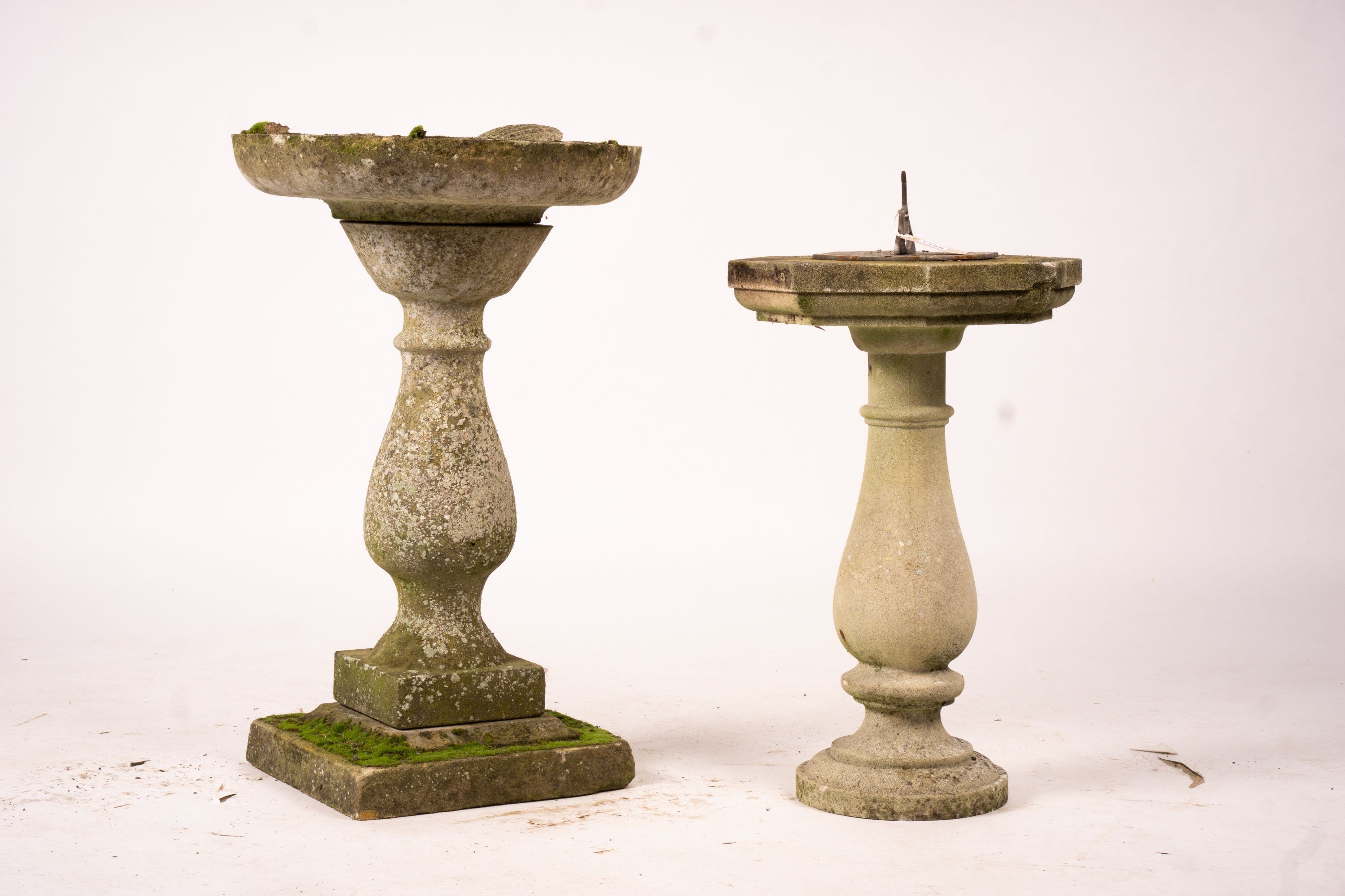 A reconstituted stone baluster pillar sundial and bird bath, tallest 72cm